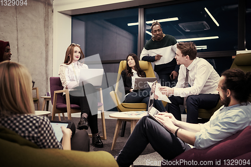 Image of Multiethnic startup business team having meeting