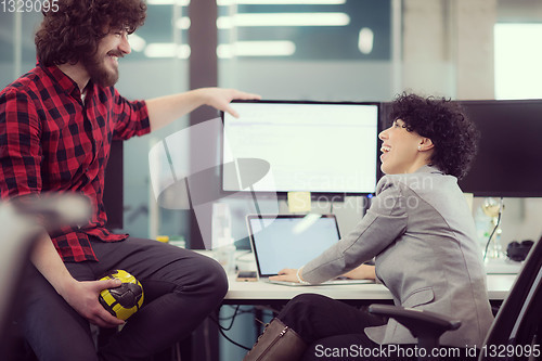 Image of software developers couple writing programming code