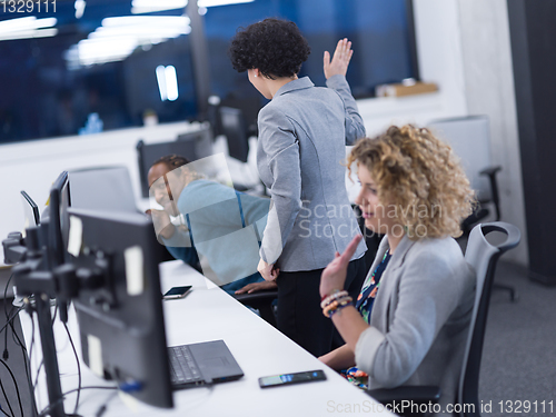 Image of multiethnics team of software developers working together