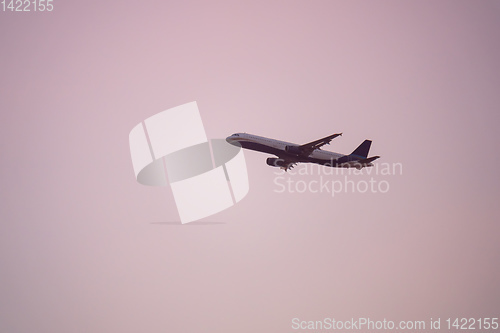 Image of plane sunset haze