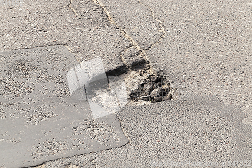 Image of Closeup broken road