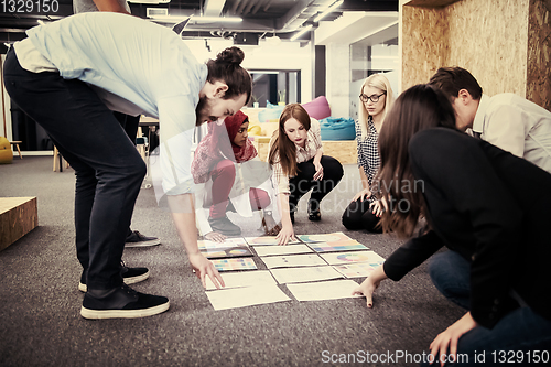 Image of black muslim woman having meeting with Multiethnic  startup busi