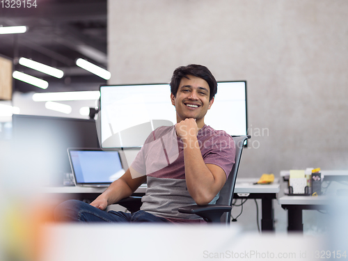 Image of Portrait of smiling software developer