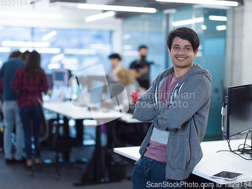 Image of Portrait of smiling male software developer