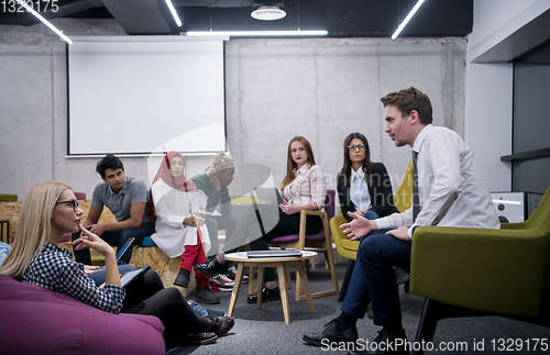 Image of Multiethnic startup business team having meeting