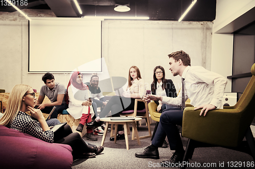 Image of Multiethnic startup business team having meeting