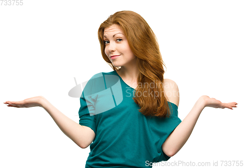 Image of Portrait of a young woman raised her hands up