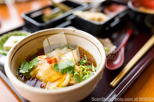 Image of Japanese tofu soup bowl in restaurant