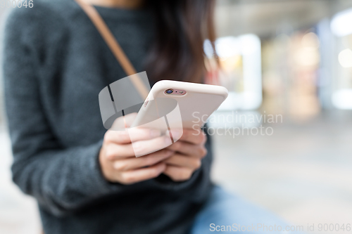 Image of Woman use of mobile phone