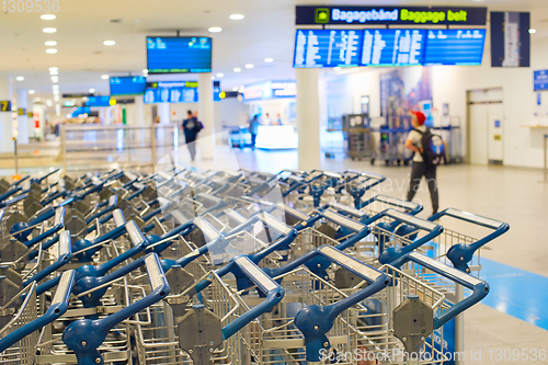 Image of Baggage trolleys at airport terminal