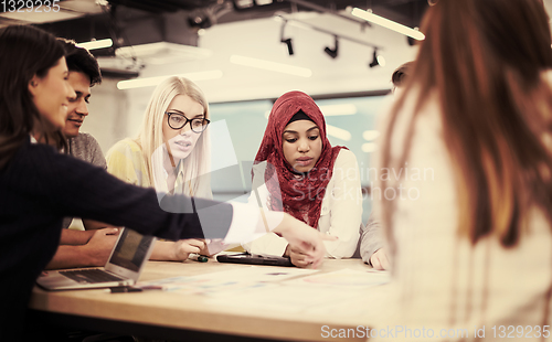 Image of Multiethnic startup business team having meeting