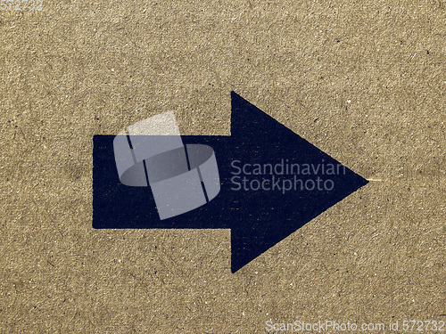 Image of Vintage looking Black arrow on cardboard