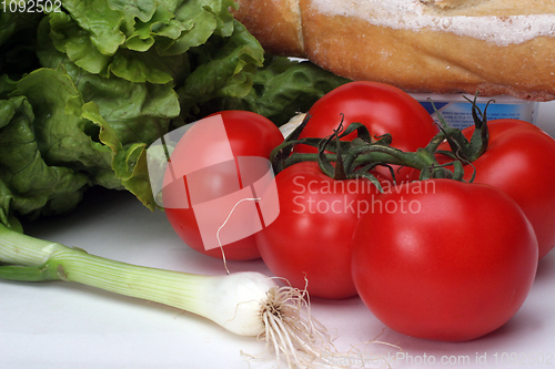 Image of Composition with raw vegetables and bread