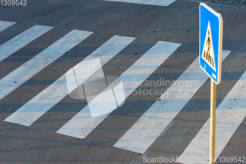 Image of pedestrian road crosswalk zebra sign