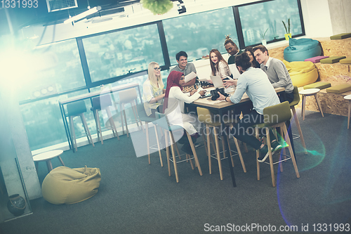 Image of Young Multiethnic Business team using virtual reality headset