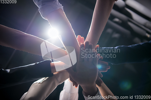 Image of multiethnic Group of young business people celebrating success