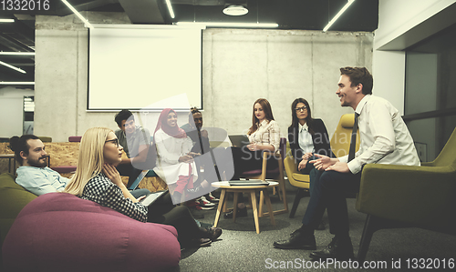 Image of Multiethnic startup business team having meeting