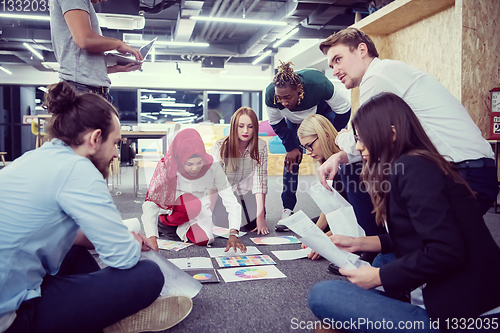 Image of black muslim woman having meeting with Multiethnic  startup busi