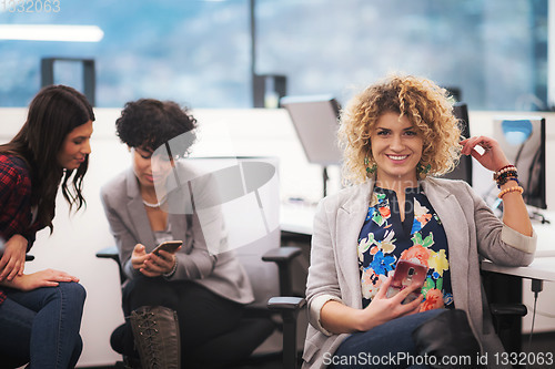 Image of Portrait of young successful female software developer