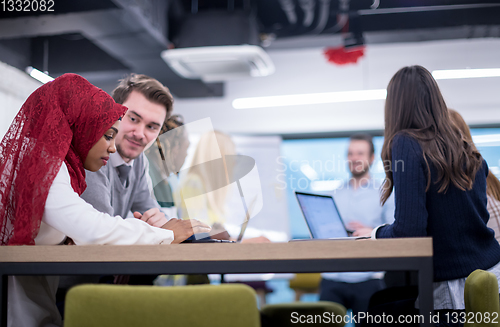 Image of Multiethnic startup business team having meeting