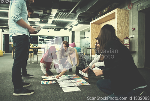 Image of black muslim woman having meeting with Multiethnic  startup busi