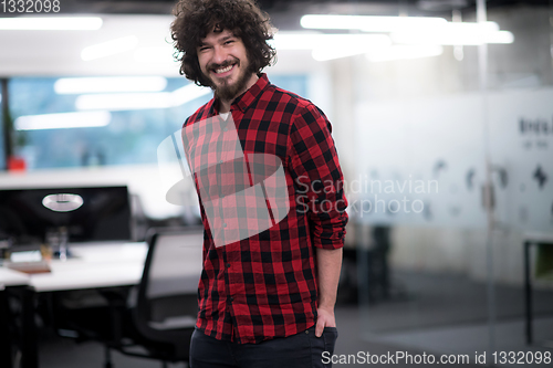 Image of Portrait of smiling male software developer