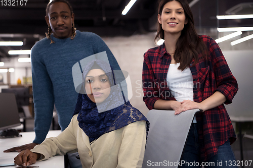 Image of multiethnics team of software developers working together