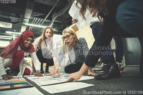 Image of black muslim woman having meeting with Multiethnic  startup busi