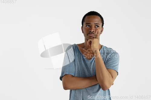 Image of Portrait of young man isolated on white studio background