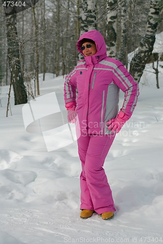 Image of Women in the winter forest. 