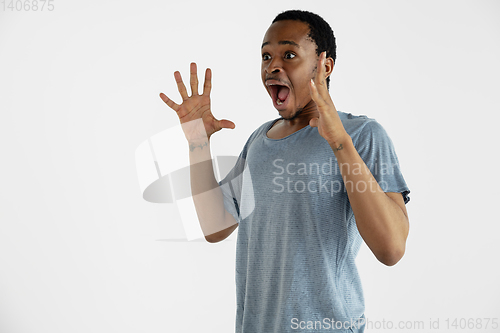 Image of Portrait of young man isolated on white studio background