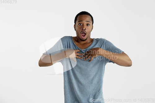 Image of Portrait of young man isolated on white studio background