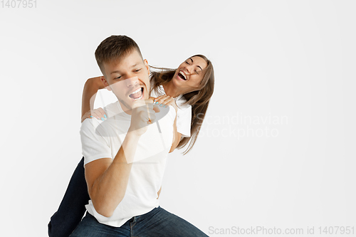 Image of Portrait of beautiful couple isolated on white studio background