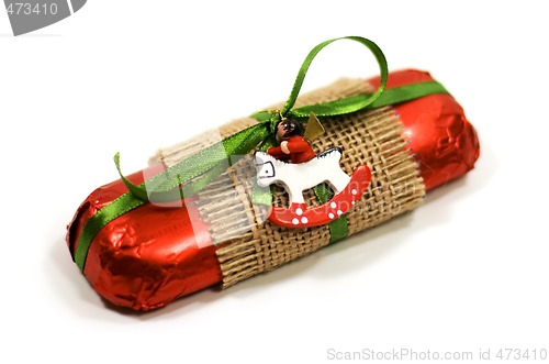 Image of red gift with decoration