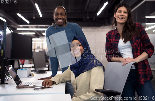 Image of multiethnics team of software developers working together