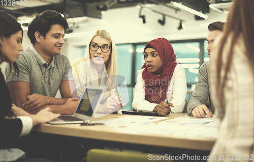 Image of Multiethnic startup business team having meeting