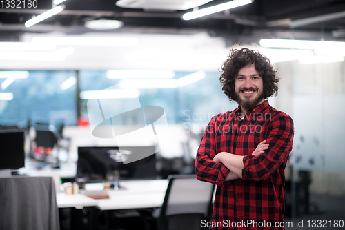 Image of Portrait of smiling male software developer