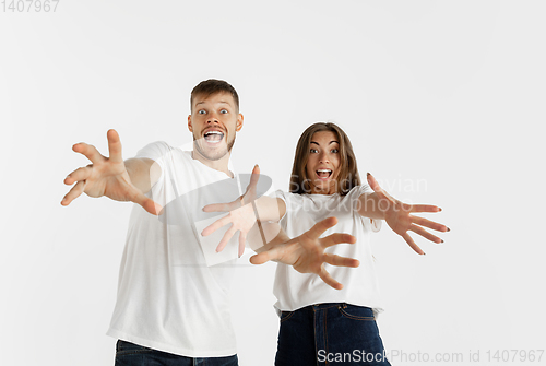 Image of Portrait of beautiful couple isolated on white studio background