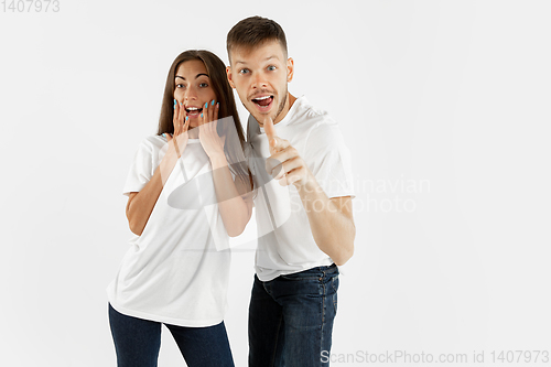 Image of Portrait of beautiful couple isolated on white studio background