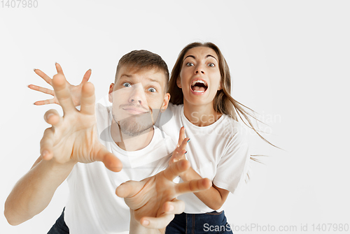 Image of Portrait of beautiful couple isolated on white studio background