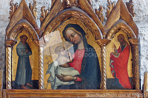 Image of Virgin Mary with baby Jesus, St. Francis and St. Mary Magdalene