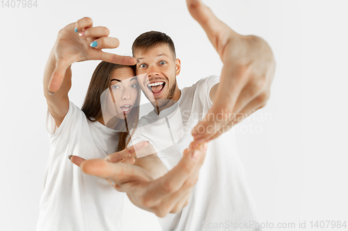 Image of Portrait of beautiful couple isolated on white studio background