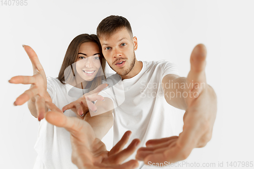 Image of Portrait of beautiful couple isolated on white studio background