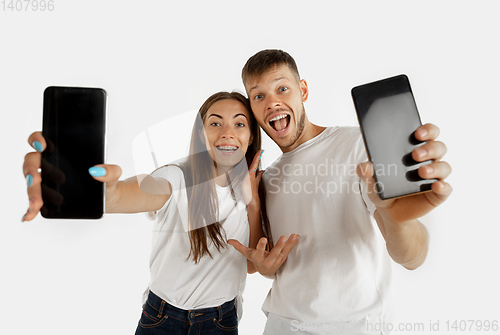 Image of Portrait of beautiful couple isolated on white studio background