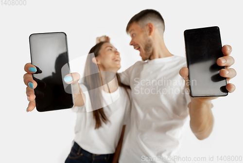 Image of Portrait of beautiful couple isolated on white studio background