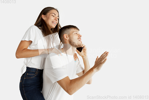 Image of Portrait of beautiful couple isolated on white studio background