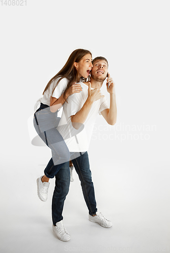 Image of Portrait of beautiful couple isolated on white studio background