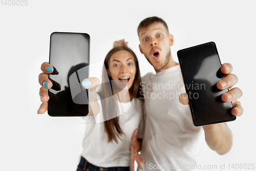 Image of Portrait of beautiful couple isolated on white studio background