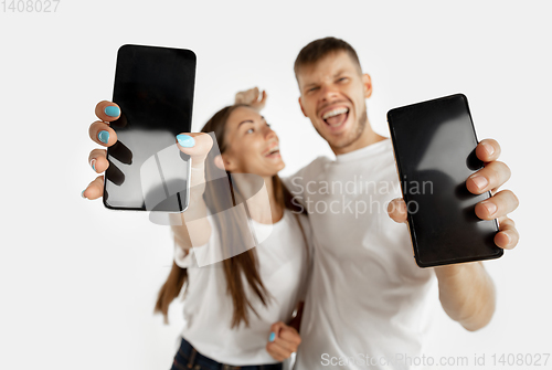 Image of Portrait of beautiful couple isolated on white studio background