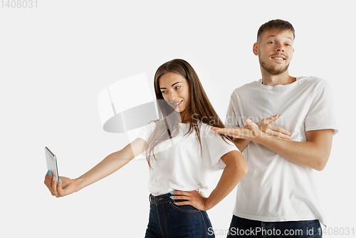 Image of Portrait of beautiful couple isolated on white studio background